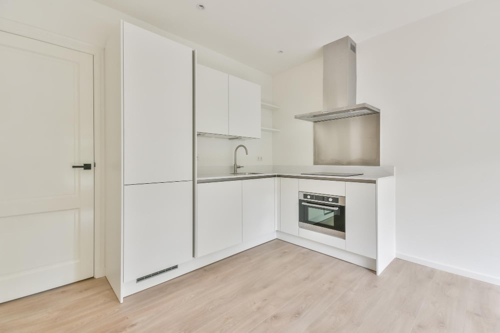 beautiful-shot-interior-design-kitchen-white-tones-min-min